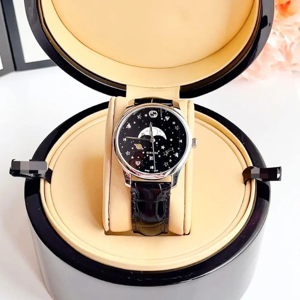 GUCCI G TIMELESS BLACK MOONPHASE WATCH.