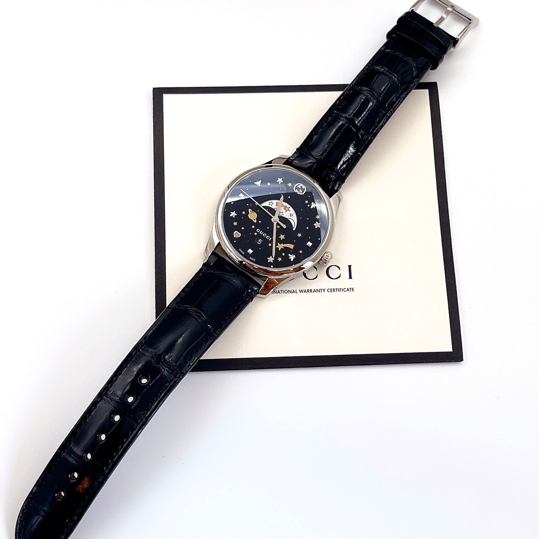 GUCCI G TIMELESS BLACK MOONPHASE WATCH.